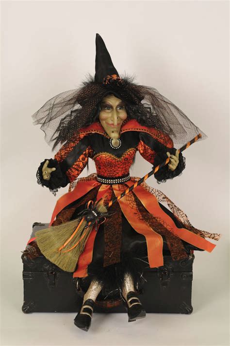 Sitting witch Halloween decoration with mechanical features
